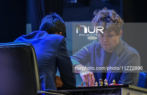 India's chess grandmaster Rameshbabu Praggnanandhaa and five-time world chess champion Magnus Carlsen of Norway face off in a rapid round of...