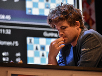 India's chess grandmaster Rameshbabu Praggnanandhaa and five-time world chess champion Magnus Carlsen of Norway face off in a rapid round of...