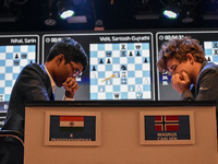 India's chess grandmaster Rameshbabu Praggnanandhaa and five-time world chess champion Magnus Carlsen of Norway face off in a rapid round of...