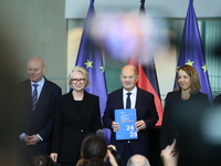 German Chancellor Olaf Scholz receives the Annual Report from the Council of Economic Experts at the Chancellery in Berlin, Germany, on Nove...