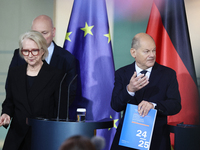 German Chancellor Olaf Scholz receives the Annual Report from the Council of Economic Experts at the Chancellery in Berlin, Germany, on Nove...