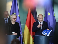 German Chancellor Olaf Scholz receives the Annual Report from the Council of Economic Experts at the Chancellery in Berlin, Germany, on Nove...