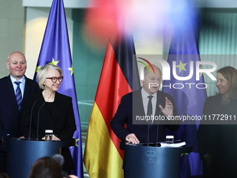 German Chancellor Olaf Scholz receives the Annual Report from the Council of Economic Experts at the Chancellery in Berlin, Germany, on Nove...