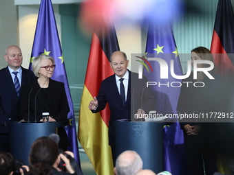 German Chancellor Olaf Scholz receives the Annual Report from the Council of Economic Experts at the Chancellery in Berlin, Germany, on Nove...