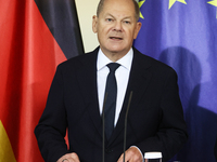 German Chancellor Olaf Scholz receives the Annual Report from the Council of Economic Experts at the Chancellery in Berlin, Germany, on Nove...