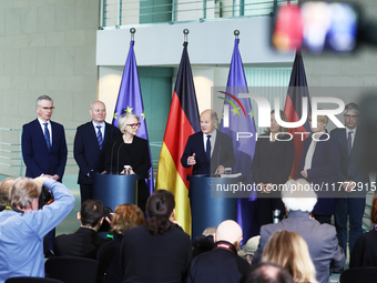 German Chancellor Olaf Scholz receives the Annual Report from the Council of Economic Experts at the Chancellery in Berlin, Germany, on Nove...