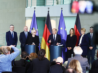 German Chancellor Olaf Scholz receives the Annual Report from the Council of Economic Experts at the Chancellery in Berlin, Germany, on Nove...