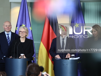 German Chancellor Olaf Scholz receives the Annual Report from the Council of Economic Experts at the Chancellery in Berlin, Germany, on Nove...