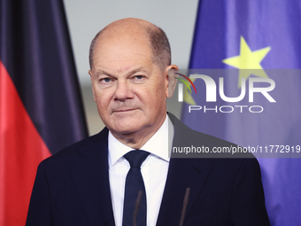 German Chancellor Olaf Scholz receives the Annual Report from the Council of Economic Experts at the Chancellery in Berlin, Germany, on Nove...