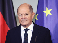 German Chancellor Olaf Scholz receives the Annual Report from the Council of Economic Experts at the Chancellery in Berlin, Germany, on Nove...