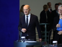 German Chancellor Olaf Scholz receives the Annual Report from the Council of Economic Experts at the Chancellery in Berlin, Germany, on Nove...