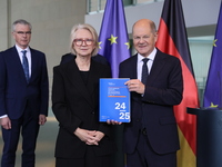 German Chancellor Olaf Scholz receives the Annual Report from the Council of Economic Experts at the Chancellery in Berlin, Germany, on Nove...