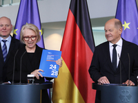 German Chancellor Olaf Scholz receives the Annual Report from the Council of Economic Experts at the Chancellery in Berlin, Germany, on Nove...