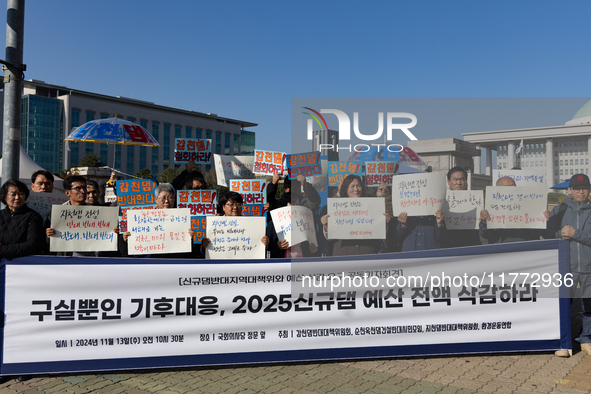 A press conference takes place in front of the National Assembly in Yeouido, organized by the Gamcheon Dam Opposition Committee, the Suncheo...