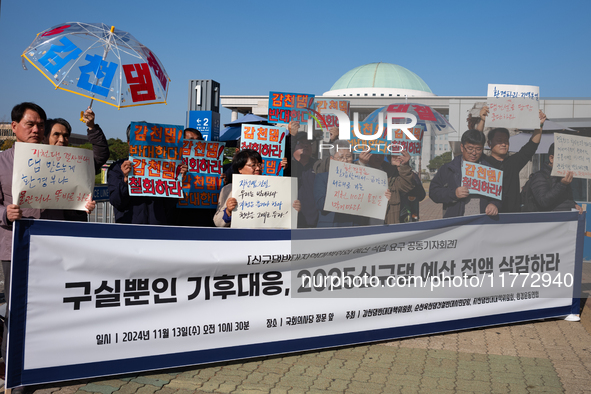 A press conference takes place in front of the National Assembly in Yeouido, organized by the Gamcheon Dam Opposition Committee, the Suncheo...