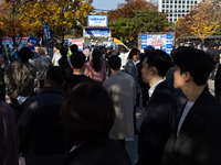 A crowd gathers in Yeouido Park, Seoul, South Korea, on November 13, 2024, to listen to Cho Kuk, leader of the Rebuilding Korea Party, as he...