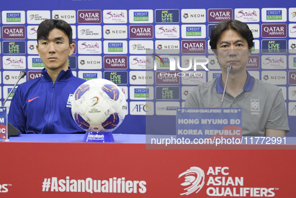 Hong Myung Bo, head coach of the Korea Republic National team, and Korea Republic National team player Hwang In-Beom attend a press conferen...