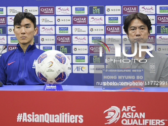 Hong Myung Bo, head coach of the Korea Republic National team, and Korea Republic National team player Hwang In-Beom attend a press conferen...