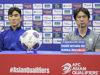 Hong Myung Bo, head coach of the Korea Republic National team, and Korea Republic National team player Hwang In-Beom attend a press conferen...