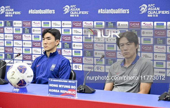 Hong Myung Bo, head coach of the Korea Republic National team, and Korea Republic National team player Hwang In-Beom attend a press conferen...