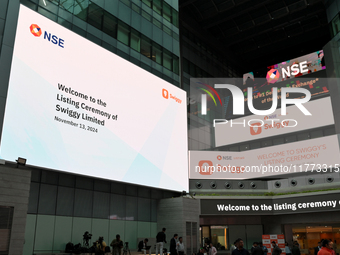 A signage board is seen inside the NSE building during the listing ceremony of its Initial Public Offering (IPO) at the National Stock Excha...