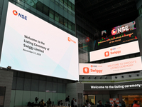 A signage board is seen inside the NSE building during the listing ceremony of its Initial Public Offering (IPO) at the National Stock Excha...