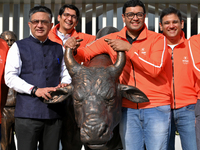 Managing Director and Group Chief Executive Officer of Swiggy, Sriharsha Majety (Center Right), and Managing Director and CEO of the Nationa...