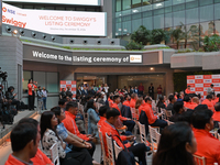 A signage board is seen inside the NSE building during the listing ceremony of its Initial Public Offering (IPO) at the National Stock Excha...