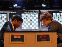 India's chess grandmaster Rameshbabu Praggnanandhaa and five-time world chess champion Magnus Carlsen of Norway face off in a rapid round of...