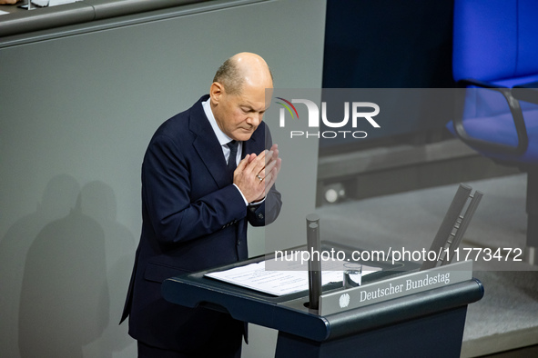 German Chancellor Olaf Scholz holds a Government Declaration at the lower house of Parliament Bundestag in Berlin, Germany, on November 13,...