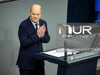 German Chancellor Olaf Scholz holds a Government Declaration at the lower house of Parliament Bundestag in Berlin, Germany, on November 13,...