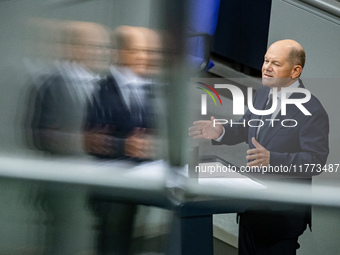 German Chancellor Olaf Scholz holds a Government Declaration at the lower house of Parliament Bundestag in Berlin, Germany, on November 13,...