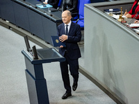 German Chancellor Olaf Scholz holds a Government Declaration at the lower house of Parliament Bundestag in Berlin, Germany, on November 13,...