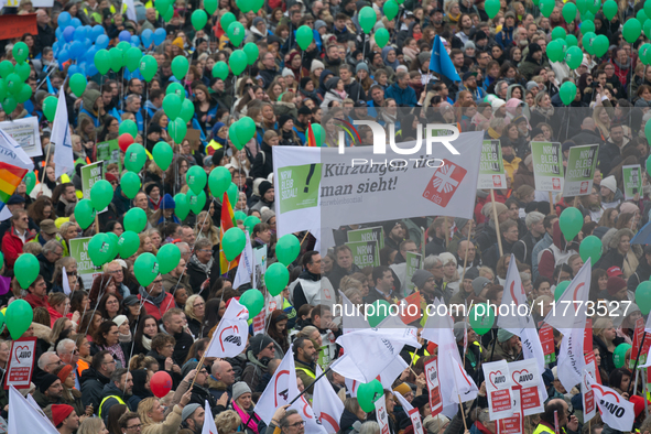 Thousands of public sector workers rally in Duesseldorf, Germany, on November 13, 2024, against state government budget cuts on public secto...