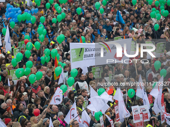 Thousands of public sector workers rally in Duesseldorf, Germany, on November 13, 2024, against state government budget cuts on public secto...