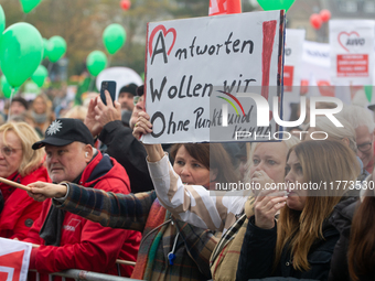 Thousands of public sector workers rally in Duesseldorf, Germany, on November 13, 2024, against state government budget cuts on public secto...