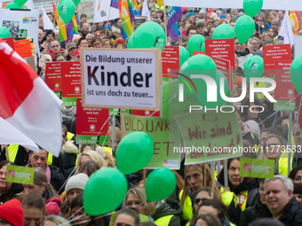 Thousands of public sector workers rally in Duesseldorf, Germany, on November 13, 2024, against state government budget cuts on public secto...