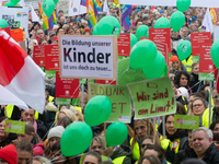 Thousands of public sector workers rally in Duesseldorf, Germany, on November 13, 2024, against state government budget cuts on public secto...