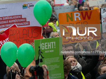 Thousands of public sector workers rally in Duesseldorf, Germany, on November 13, 2024, against state government budget cuts on public secto...