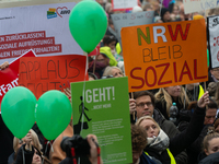 Thousands of public sector workers rally in Duesseldorf, Germany, on November 13, 2024, against state government budget cuts on public secto...