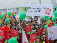 Thousands of public sector workers rally in Duesseldorf, Germany, on November 13, 2024, against state government budget cuts on public secto...