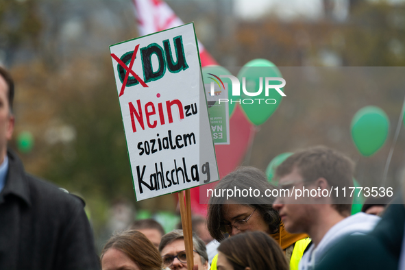 Thousands of public sector workers rally in Duesseldorf, Germany, on November 13, 2024, against state government budget cuts on public secto...