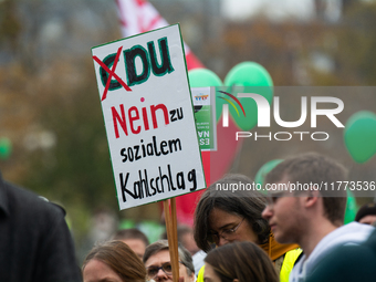 Thousands of public sector workers rally in Duesseldorf, Germany, on November 13, 2024, against state government budget cuts on public secto...