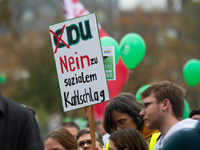 Thousands of public sector workers rally in Duesseldorf, Germany, on November 13, 2024, against state government budget cuts on public secto...