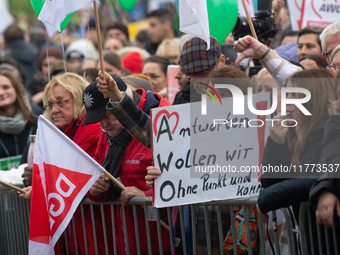 Thousands of public sector workers rally in Duesseldorf, Germany, on November 13, 2024, against state government budget cuts on public secto...