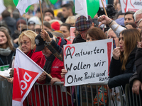 Thousands of public sector workers rally in Duesseldorf, Germany, on November 13, 2024, against state government budget cuts on public secto...