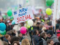 Thousands of public sector workers rally in Duesseldorf, Germany, on November 13, 2024, against state government budget cuts on public secto...