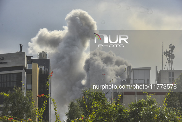 Smoke rises among the residential buildings following an Israeli attack on Ghobeiry municipality located in the Dahieh region in Beirut, Leb...