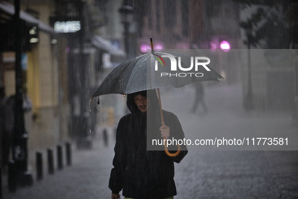 Heavy rainfall leads to significant flooding in various parts of Malaga, including major streets and public areas. 