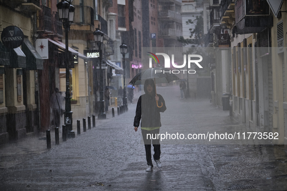 Heavy rainfall leads to significant flooding in various parts of Malaga, including major streets and public areas. 